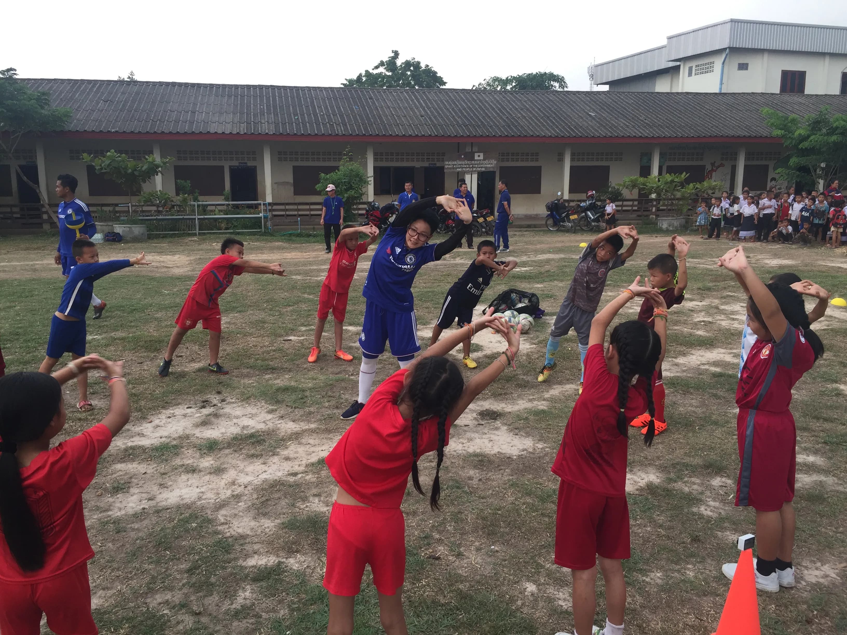 Coaches participating in a Coach the Coaches workshop in Laos